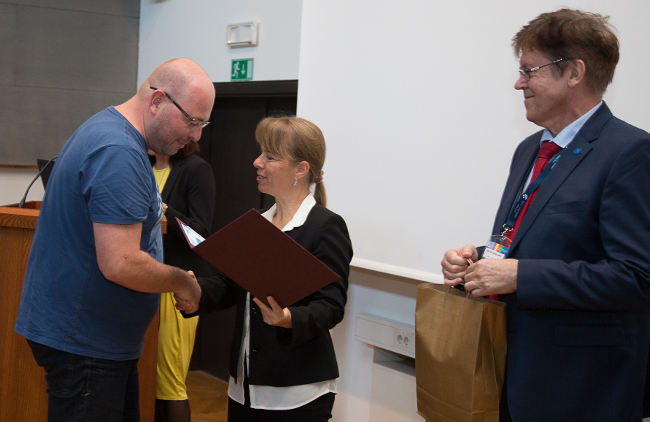 Gregor receiving the award for best computer science teacher in Slovenia